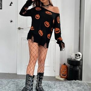 Jack-o’-lantern patterns, drop shoulders, distressed sweater